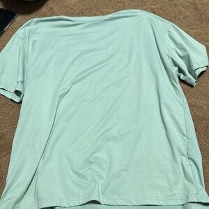 green graphic tee